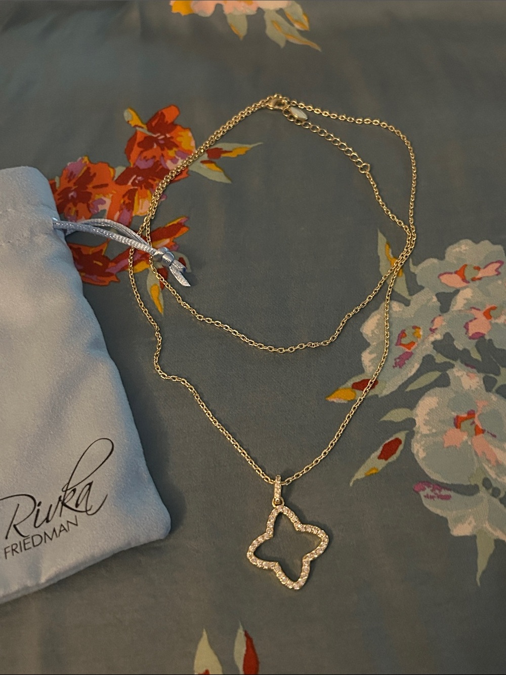 Rivka Friedman,quatrefoil flower necklace. 36 inches, 18k gold clad.